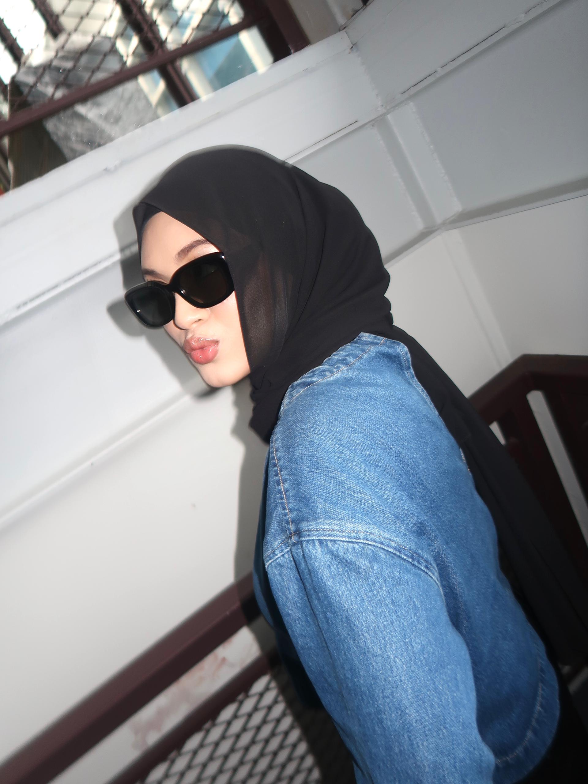 Women with hijab in stylish asian fitting Korean Style Unisex sunglasses. A pair of square-shaped, Cat-eye retro sunglasses with a full plastic frame, .Womens Asian fitting Sunglasses. Icon in Black