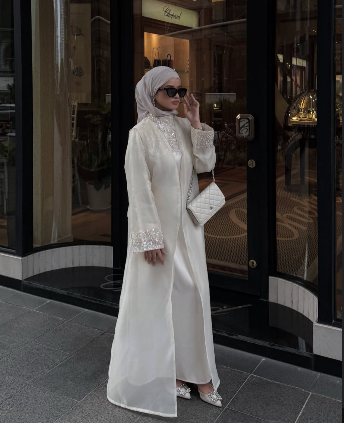 Model with hijab in womens sunglasses . Maya in Black - Gradient Lenses 