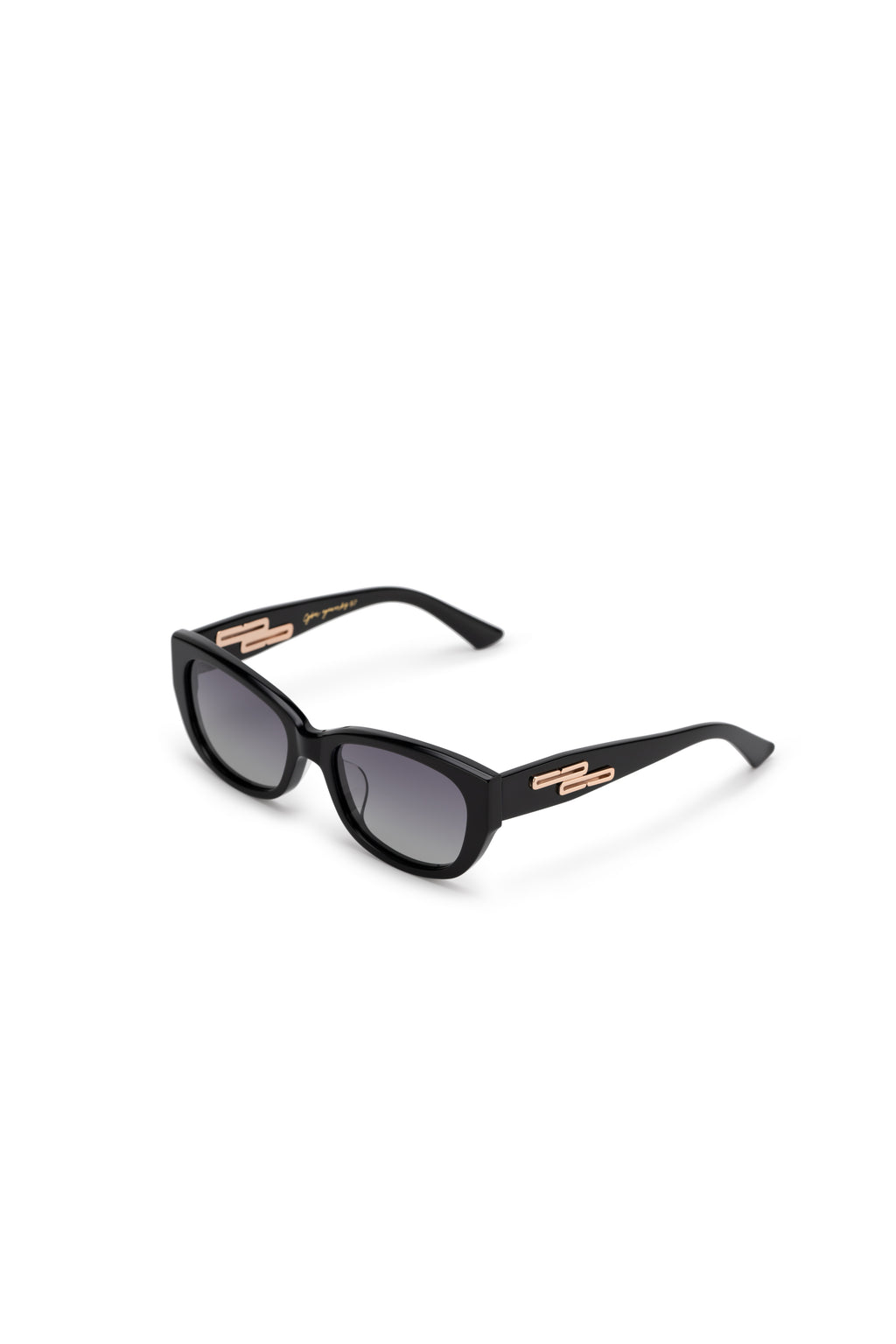 Women with hijab in stylish asian fitting sunglasses. A pair of square-shaped, green-tinted sunglasses with a full plastic frame.Womens Asian fitting Sunglasses. Ruby in Black - Gradient Lens 