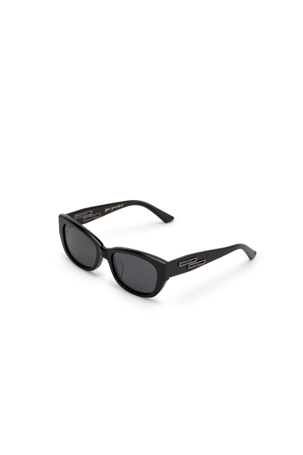Women with hijab in stylish asian fitting sunglasses. A pair of square-shaped, green-tinted sunglasses with a full plastic frame.Womens Asian fitting Sunglasses. Ruby in Black - Black Lens 