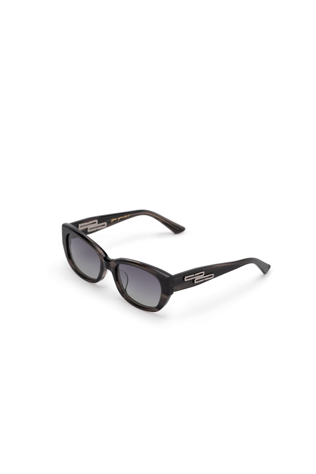 Women with hijab in stylish asian fitting sunglasses. A pair of square-shaped, green-tinted sunglasses with a full plastic frame.Womens Asian fitting Sunglasses. Ruby in Marble Grey - Gradient Lens 